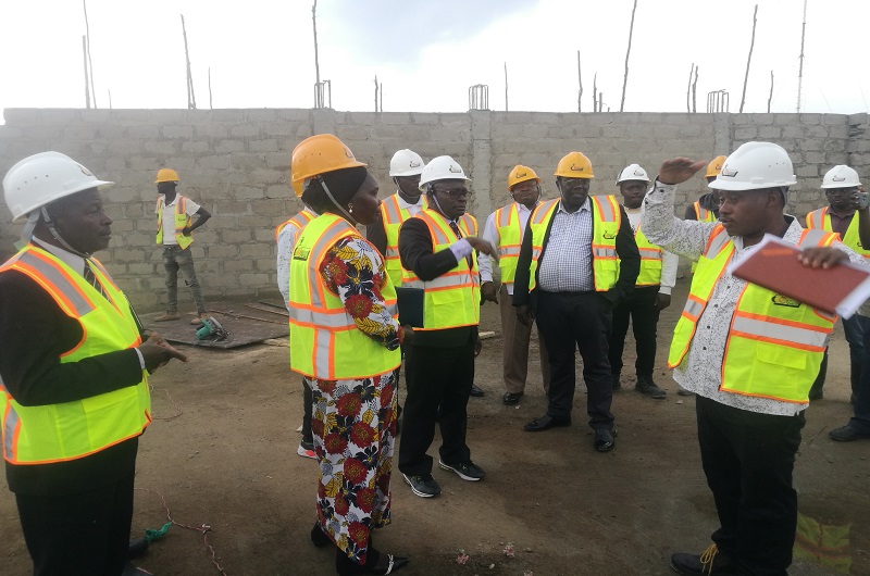 Lt. Niwamanya R while explaining the level of site progress to EC and Arua City officials on Friday