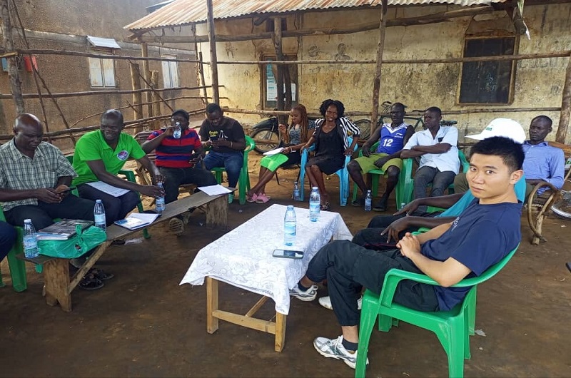 Chinese Investor, Ming looks on during the meeting convened by Arua spare motors association leaders on Tuesday. Photo Credit Andrew Cohen Amvesi