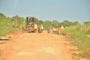 Graders fixing bad spots along the Koboko-Yumbe-Moyo road on Friday.