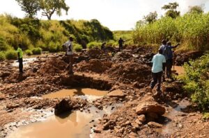 Locals involved in gold mining along the shores of Ore river in West Nile. Courtesy photo