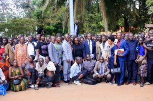 The Govt Assurances Committee members pose for a group photo with some of the Kony war victims in Arua on Thursday. Courtesy photo