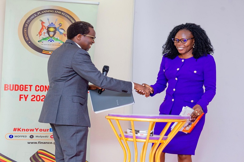 Dr. Omona welcomes Minister Anite to make her remarks during the budget consultative meeting on Monday. COURTESY PHOTO