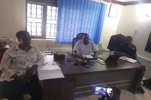 Abaho addresses journalists as Sanyu (L) and the officer in charge of enforcement in Arua looks on. Photo_Credit, Andrew Cohen Amvesi