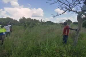 Locals showing part of the contested land in Biacici village recently