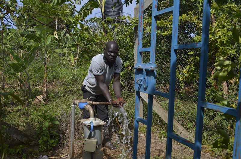 Ondoma shows the irrigation facility donated to him by the district.