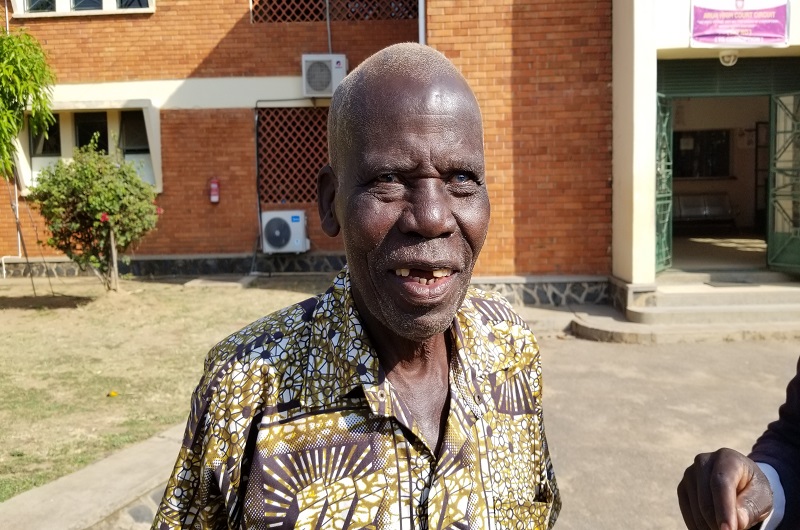 Girism Ambayo stresses a point to journalists at Arua High Court on Tuesday