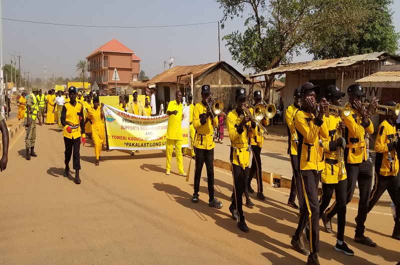 Arua Mother City SACCO members march on the streets of Arua city to mark their day on Saturday