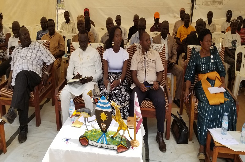 Hon. Driwaru Jennifer (R) and other invited guests join MP Oguzu (2L) at Maracha PS on Wednesday