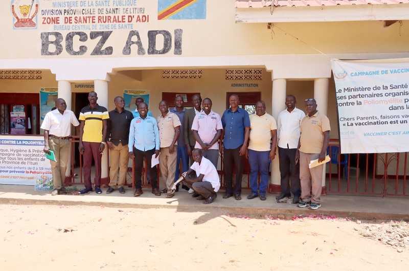 ACAV officials pose for a group photo with Chefferie de Kakwa community members shortly after handingover the medical supplies