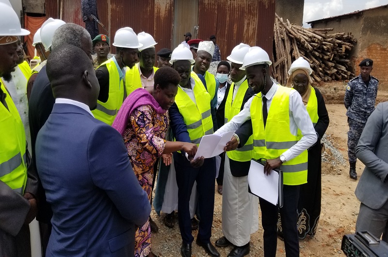 The Irishad mosque construction Engineer shows H.E Alupo the Artistic Impression on the mosque