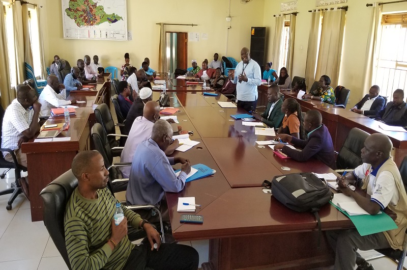 David Kyasanku while briefing the new ACDF members and Arua city technical staff ahead of their interface on Thursday