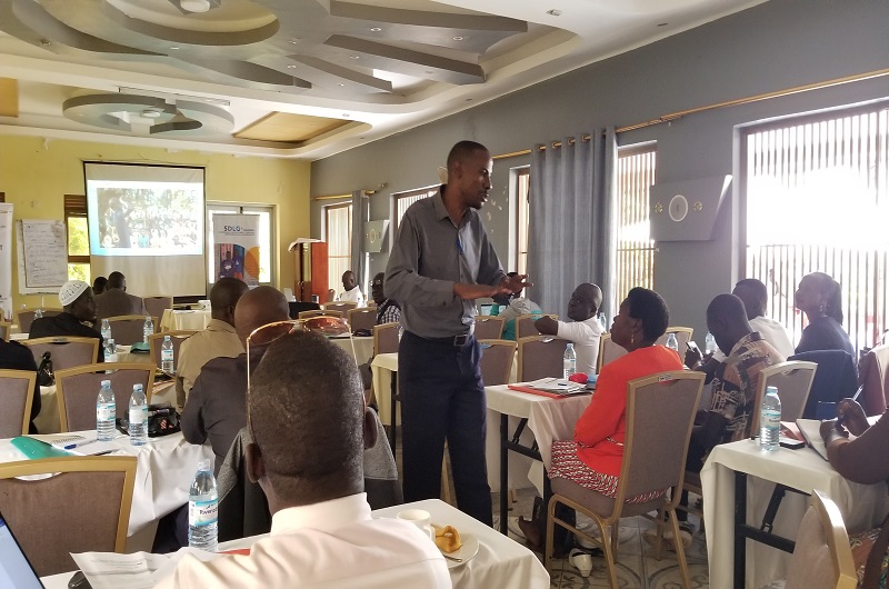 Stephen Bwogere speaking to some of the new ACDF members and stakeholders during their training