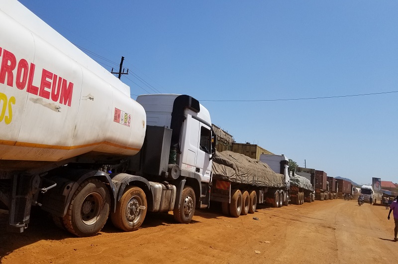 Different trucks lined for clearance at Elegu border post on Tuesday