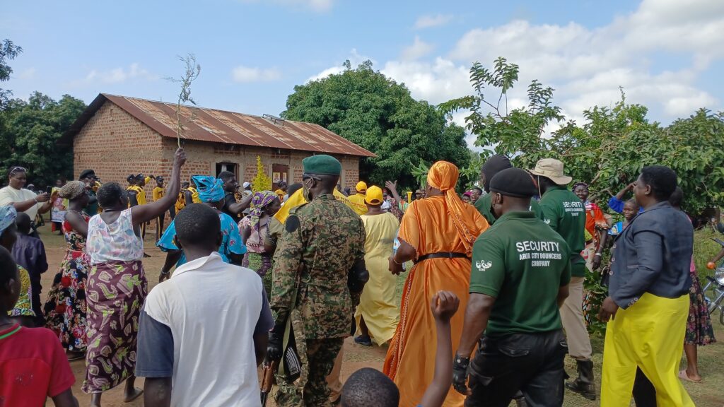 supporters at the home of Zoe Bakoko in Muni