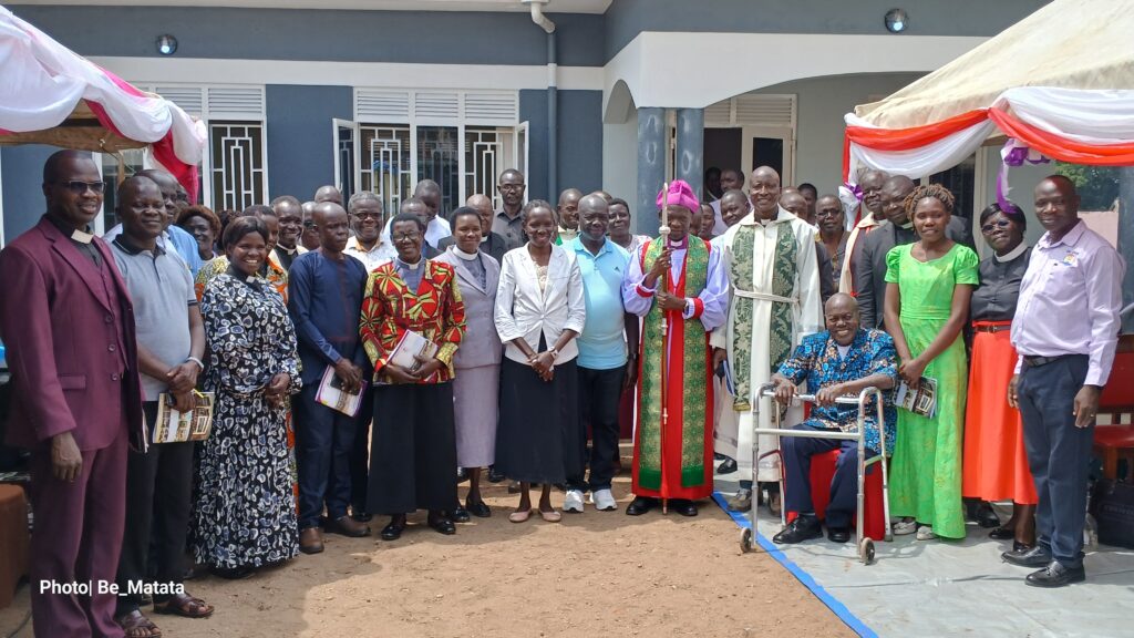 Bishop Charles Collins Andaku in a group photo after commissioning the new office block