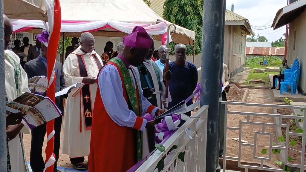 Bishop cuts ribbon on the new office block