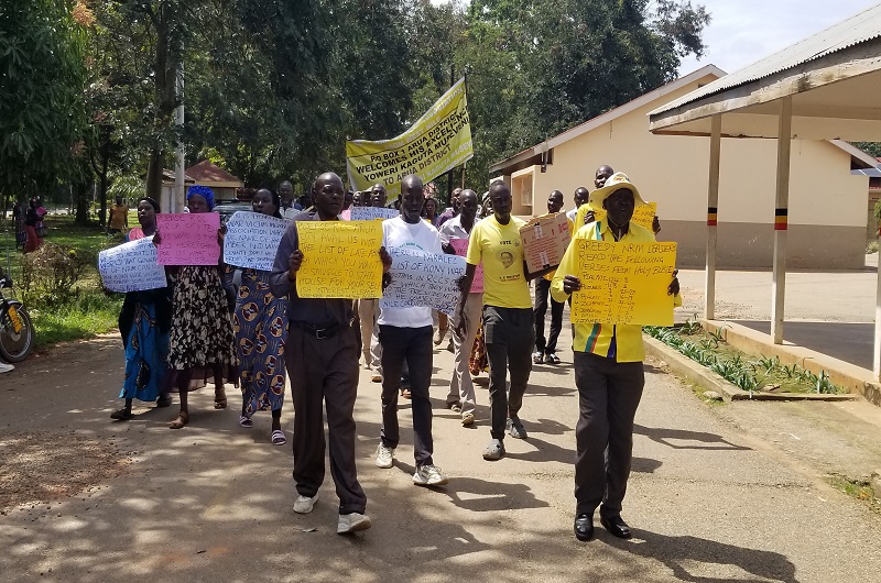The Kony war victims while marching to Arua RCC's office on Thursday