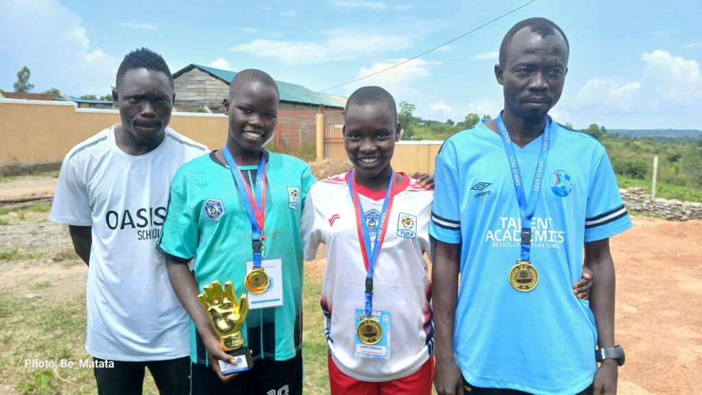 The two coaches of Oasis at the both ends in a picture with MVP and best Goal Keeper
