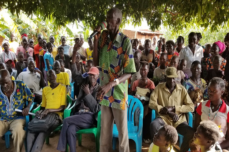 An elderly man encouraging locals to vote for Eng. Tiyo during one of his rallies on Monday