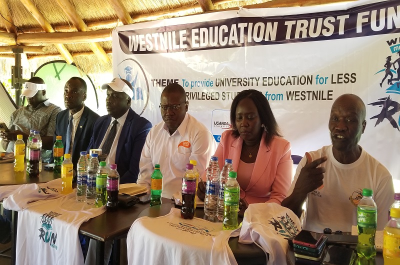 Matua (R) stresses a point during the WNETF marathon launch press briefing on Wednesday. Photo Credit, Andrew Cohen Amvesi