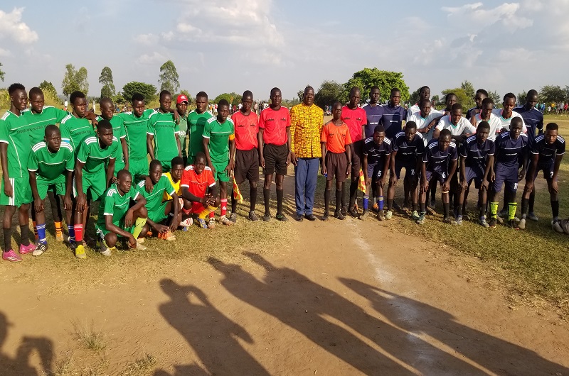 Atiku (C) in a group photo with players and match officials before the kick-off of Nyiovurra vs Alivu game on Sunday. Photo Credit, Andrew Cohen Amvesi