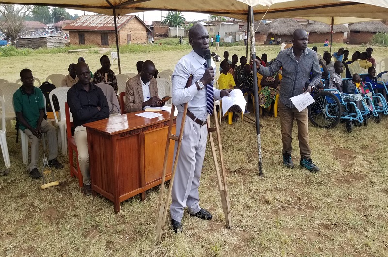 Dick Nyomia speaking during the function