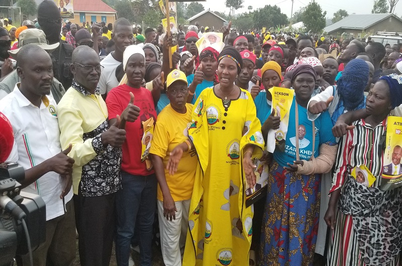 Hajjat Medina while receiving the FDC converts during MP Atima's rally on Friday. Left is Edema. Photo Credit, Andrew Cohen Amvesi