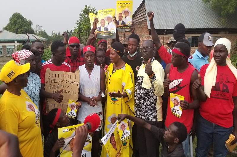 Medina having a light moment with some of the NUP converts shortly after the rally on Friday. Photo Credit, Andrew Cohen Amvesi