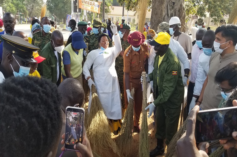 RCC Akello, MP Atima, city officials and other officials participate in cleaning Arua city center on Thursday. Photo Credit, Andrew Cohen Amvesi