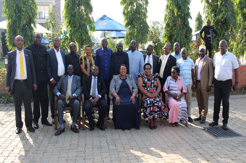 Minister Babalanda (Seated C) poses for a group photo with West Nile RDCs on Wednesday.