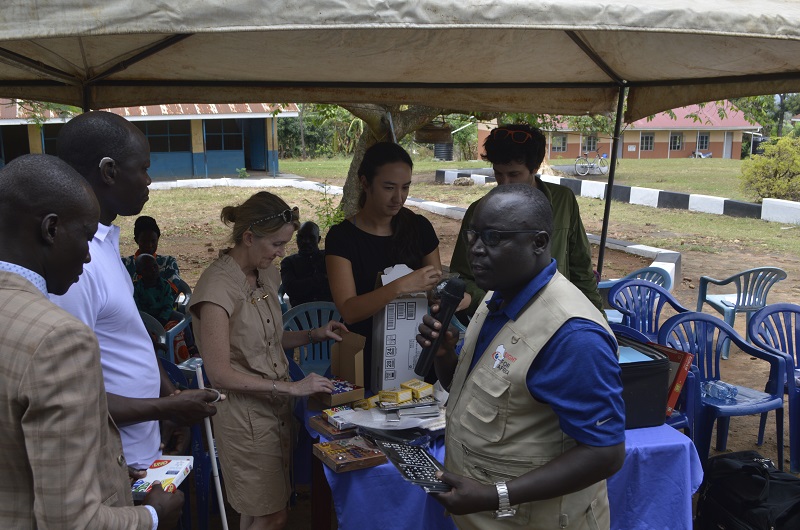 Robinson Afema (C) speaks after inspecting the assorted equipment. Photo Credit; Clement Aluma