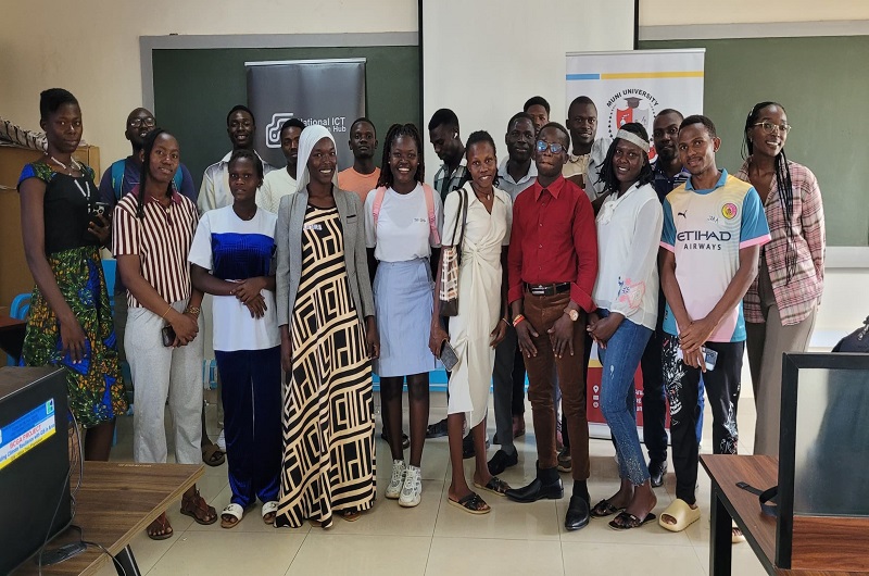 A section of students,administartors and facilitors possing for photo at the closure of five day training. Photo Credit; Clement Aluma