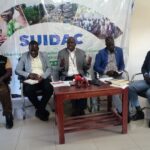 David Kyasanku (C) speaking during the SUIDAC press conference on Thursday. Photo Credit; Andrew Cohen Amvesi