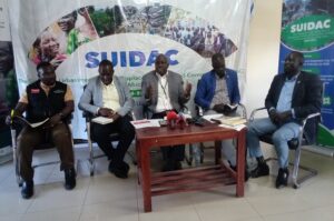 David Kyasanku (C) speaking during the SUIDAC press conference on Thursday. Photo Credit; Andrew Cohen Amvesi