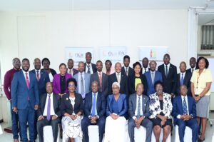 Mr. Benson Turamye, IGG Lady Justice Naluzze Aisha Batala, Mr. Edward Akol, Mrs. Anne Twinomugisha Muhairwe and Mrs. Rose Kafeero (seated), and other staff from IG, PPDA an