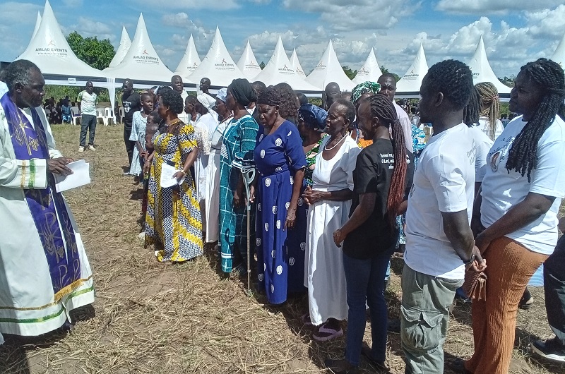 The Clergy preparing to pray for Late Edemaga's family. Photo Credit; Andrew Cohen Amvesi