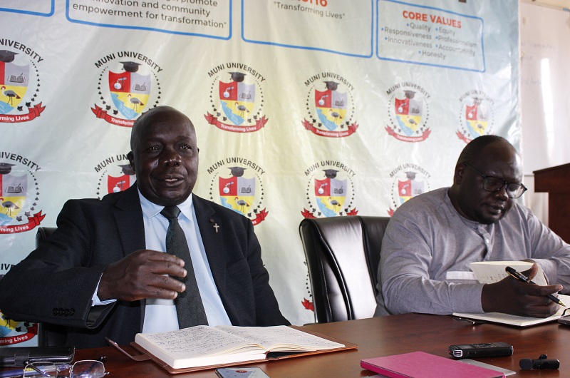 Assoc. Prof. Katrini stresses a point as Eng. Aita (R) takes note during the media briefing on Tuesday