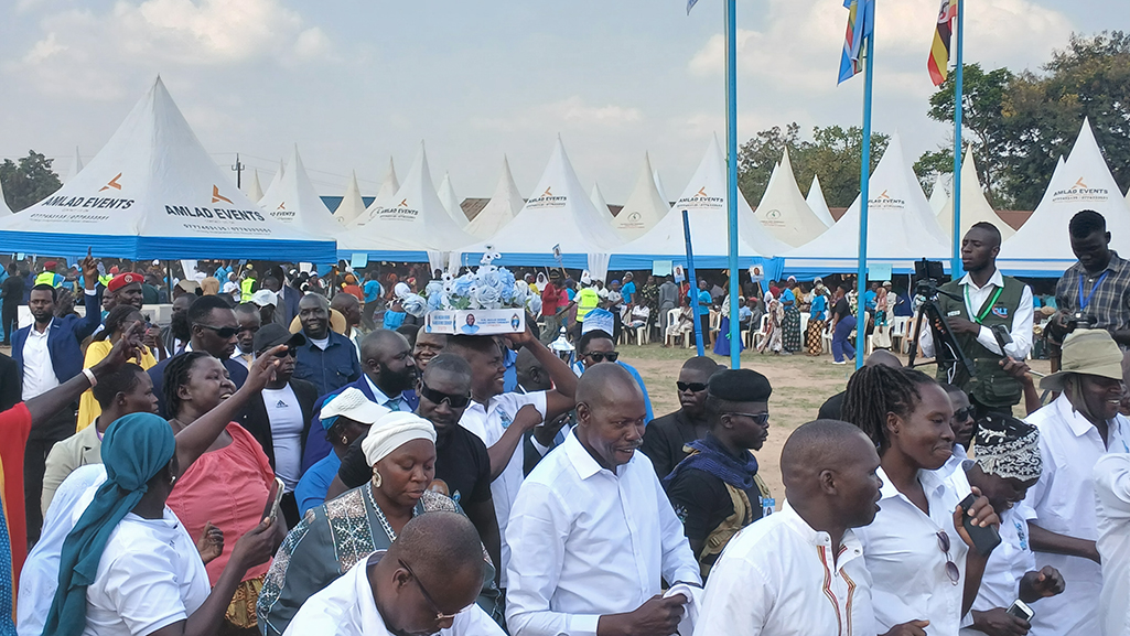 Crowd cheering Hon. Muzaid's victory during the Thanksgiving event. Photo by Matata Benzamin