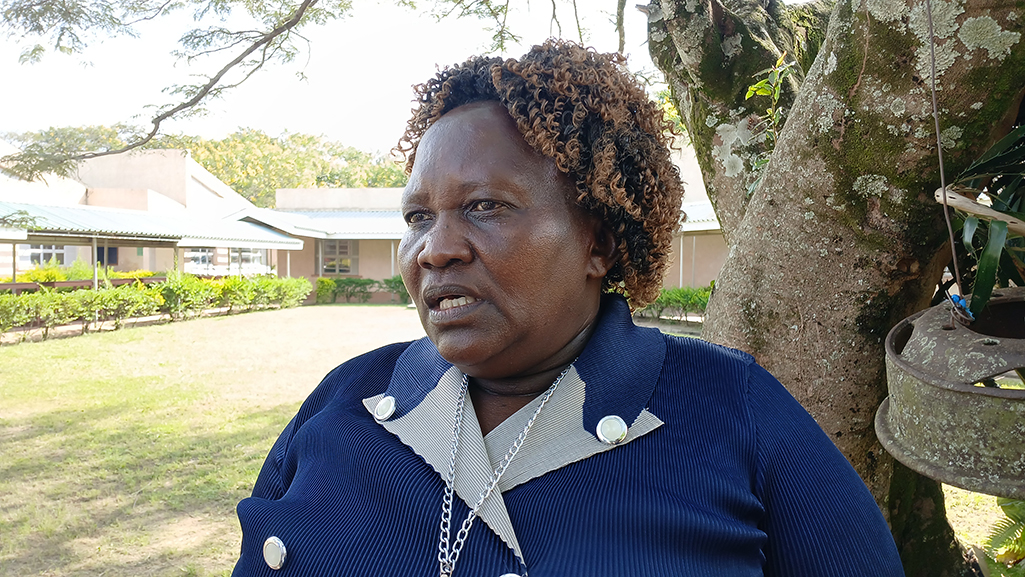 Daisy Aliwaru, the Dean of UNiTE Muni Campus, encouraging people to join teaching profession Photo by Matata Benzamin