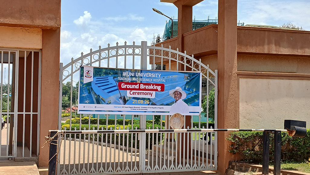 Graphical Banner displayed at Muni University gate showing a portrait of President Museveni as Chief Guest. Photo by Matata Benzamin