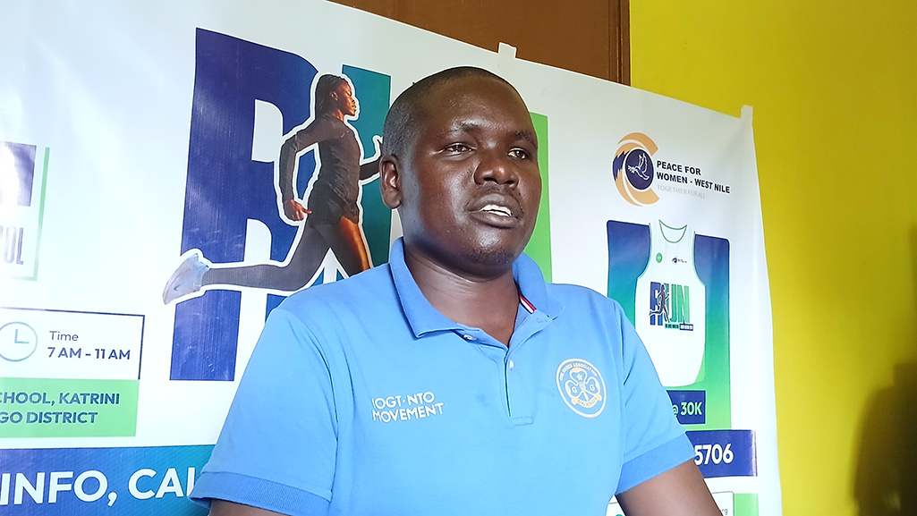 The acting Communications Officer for USEF Sabino Ringua, speaking to the press about the third edition of the charity run. Photo by Matata Benzamin