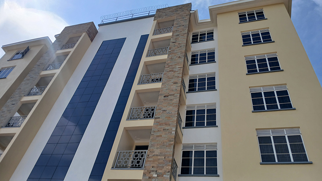 The face of the 7-storied building accomodation facility with 21 housing units for the health workers. Photo by Matata Benzamin