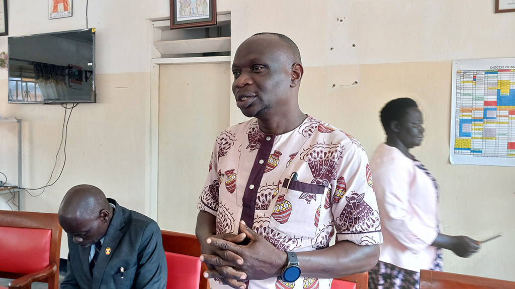 the Madi West Nile Diocesan Secretary, Nasser Godfrey pledging commitment Photo Credit Benzamin Matata