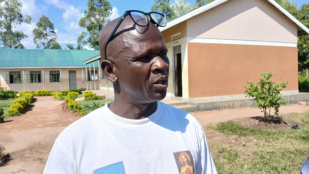 Ponzio Angundru, the School Management Committee Chairperson of Anyara Primary School speaking to the press on Developments and challenges Photo by Matata Benzamin