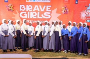 Students pose for a photo moment during the Brave Girls Festival in Yumbe on Monday