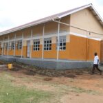 Excitement as MoWE, EU Officials commission 3-classroom block and VIP latrines at Yumbe SS