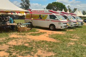 The three brand-new Ambulances MP Dramviku donated being parked besides the sewing machines and saloon equipment (L) during the commissioning exercise on Monday