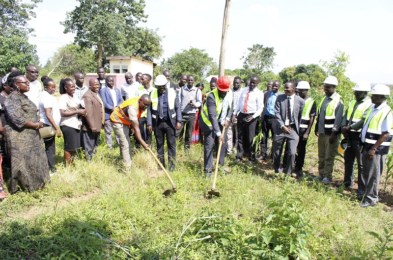 A team from MoWE, contractor and Omoro district officials led by the district chairperson, Andrew Okot Obibi during groundbreaking ceremony for the EU-WASH projects at Lalogi primary school