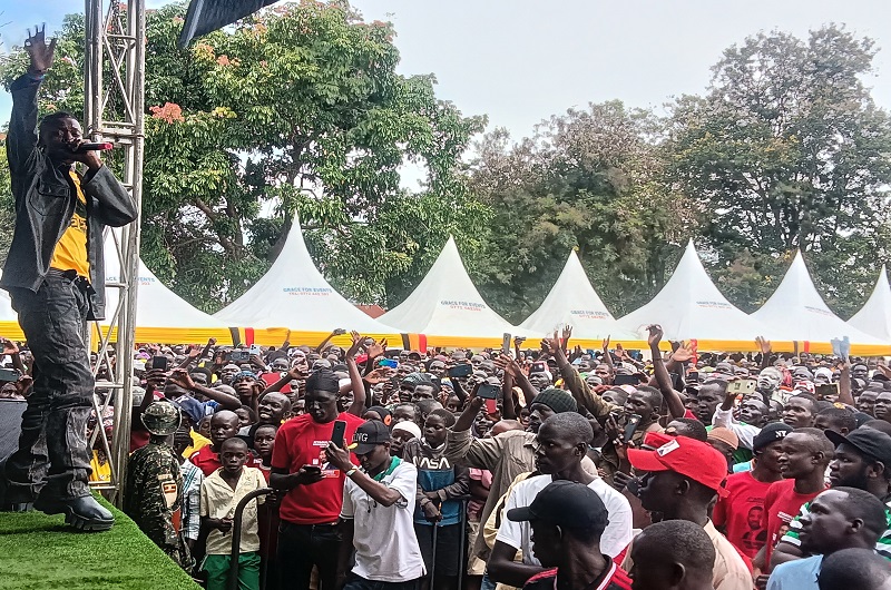 Artiste Jose Chameleon performing for the cheering crowd during Gen. Muhoozi's endorsement in Koboko district on Wednesday
