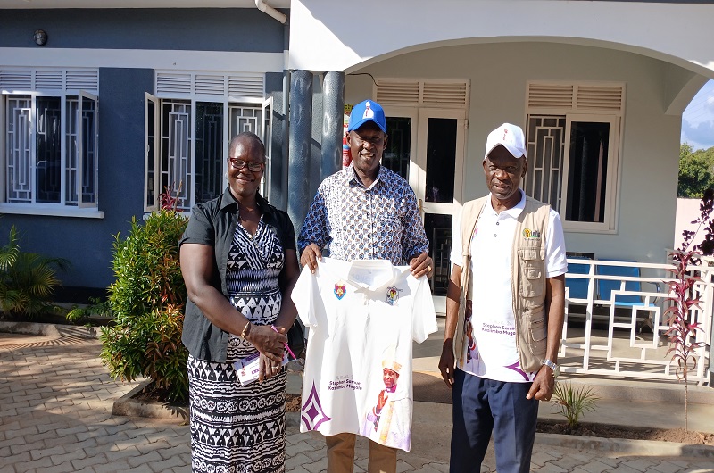 Bishop of Madi West Nile Diocese, Rt. Rev. Charles Collins Andaku (Right), Moses Obeta COC chair (Middle) and Bilha Angualiru (Left) in a frame. Photo by Matata Benzamin